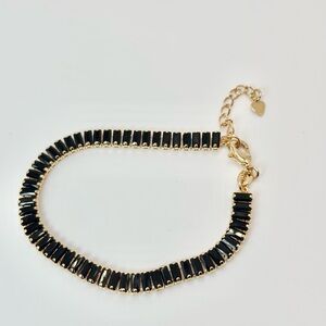 Elegant Gold and Black Bracelet